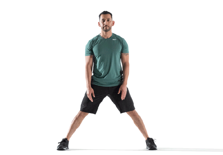 GIF: Man demonstrates Standing Straddle Stretch