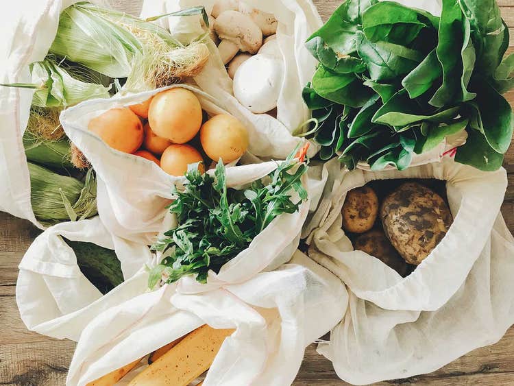 vegetables on a table in bags