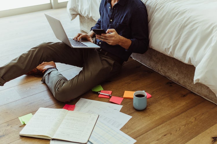 hero-five-steps-man-sitting-with-laptop