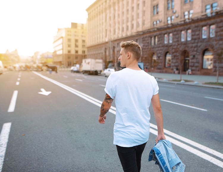 1-man-walking-down-the-street